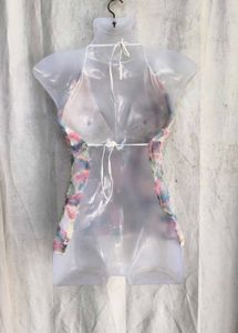 69. Sheer Floral Applique Halter Top