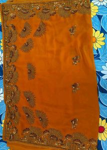 Elegant rust brownish touch saree