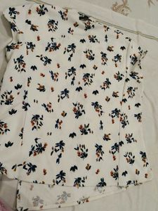 Looking for a trendy white top? Here it is