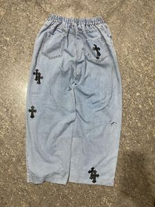 Cross Print Denim Jeans