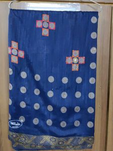 Elegant Blue Sari with Geometric Embellishments