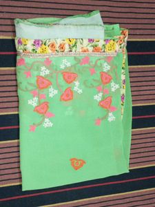 Beautiful Green Saree with Floral Embellishments
