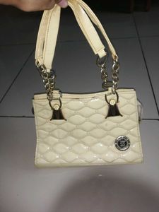 Elegant Cream Quilted Handbag