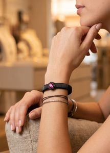 Elegant Black Bracelet with Pink Stone