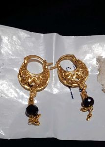 Elegant Gold Jhumka Earrings with Black Stone