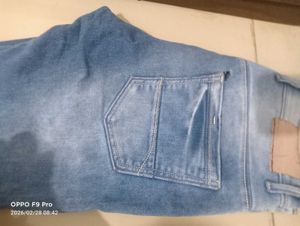 Stylish Light Wash Denim Jeans with Unique Patch D