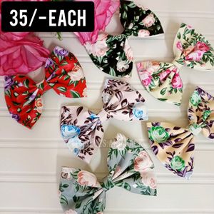 Leather Bows at just 35/-