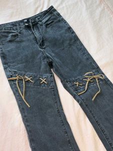 Flared Jeans with Lace-Up Detail