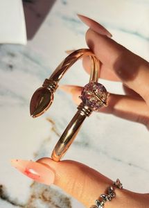 Elegant Rose Gold Bangle with Amethyst Stone
