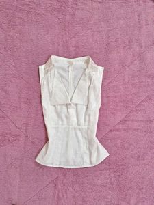Elegant White Sleeveless Blouse