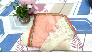 cream nd light orange saree with  Embroid