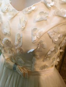 Elegant Cream Party Dress with Embellishments
