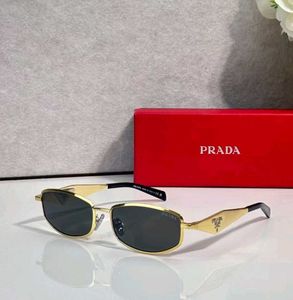 Prada Sunglasses - Gold Frame
