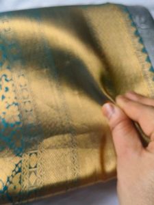 Exquisite Grey Silk Saree with Gold Border