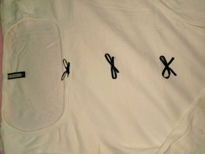 Cream Ribbed Top with Black Bows