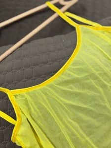 Yellow one-piece swimsuit with a deep scoop back
