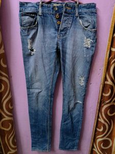 Distressed Blue Denim Jeans