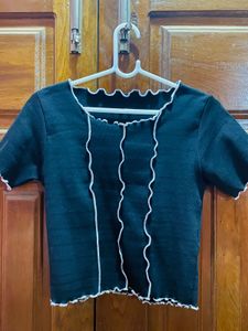 Chic Black Lettuce Hem Top
