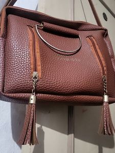 Sling Bag In Dark Brown Color Not Used New Item Very Spacious Have Multiple Sections