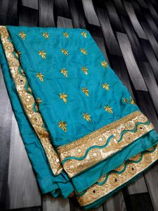 Beautiful Teal Saree with Gold Embroidery