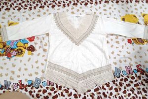 Elegant Cream Kurta with Lace Detail