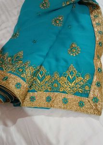 Stunning Teal Saree with Gold Embroidery