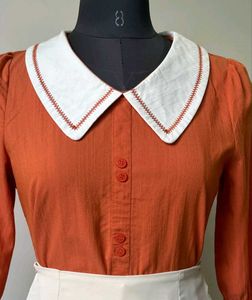 Retro Orange Top with White Pan Collar