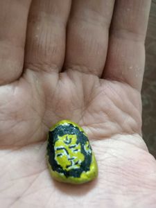 Hand-Painted Lion Face Stone Art