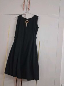 Chic Black Sleeveless Dress with Embellishment