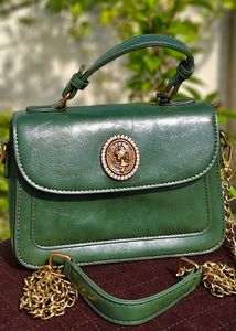 Chic Green Handbag with Gold Accent