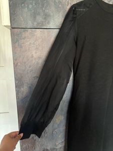 Chic Black Dress with Sheer Sleeves