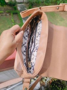 Roxbury brown sling bag