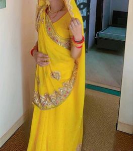 Exquisite Yellow  heavy Embellished Saree