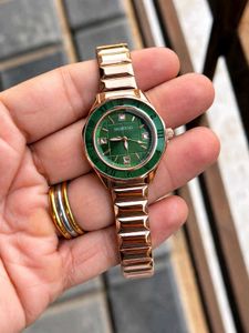 Elegant Gold Tone Swarovski Watch