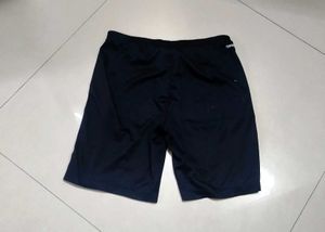 Reebok training shorts.