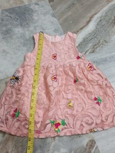 Adorable Pink Lace Dress with Butterfly Motifs