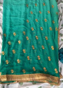 Stunning Teal Saree with Gold Embroidery