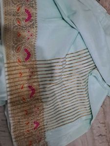 Elegant Light Blue Saree with Gold Border