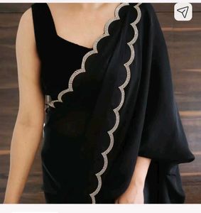 Elegant Black Saree with Scalloped Edges