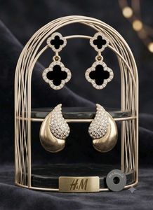 Sale_ Elegant Gold & Black Clover Earrings