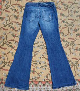 Ripped Flared Jeans
