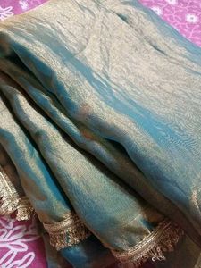 Elegant Teal Saree with Embellished Border