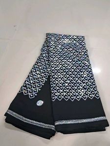 Elegant Black Saree with Silver Embellishments