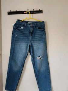 Distressed Blue Denim Jeans