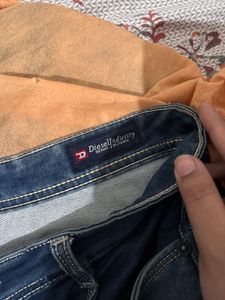 Distressed Blue Denim Jeans