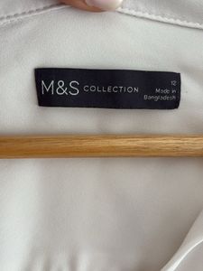 Chic White Button-Up Shirt with Side Stripe
