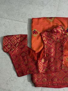Elegant Orange Saree with Red Blouse