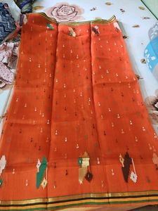 Vibrant Orange Saree with Geometric Pattern