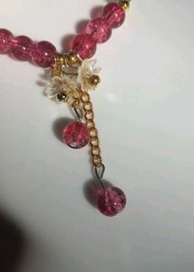pink Beaded Bracelet with acrylic floral hanging
