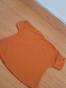 Cute Orange Top with Bow Accent